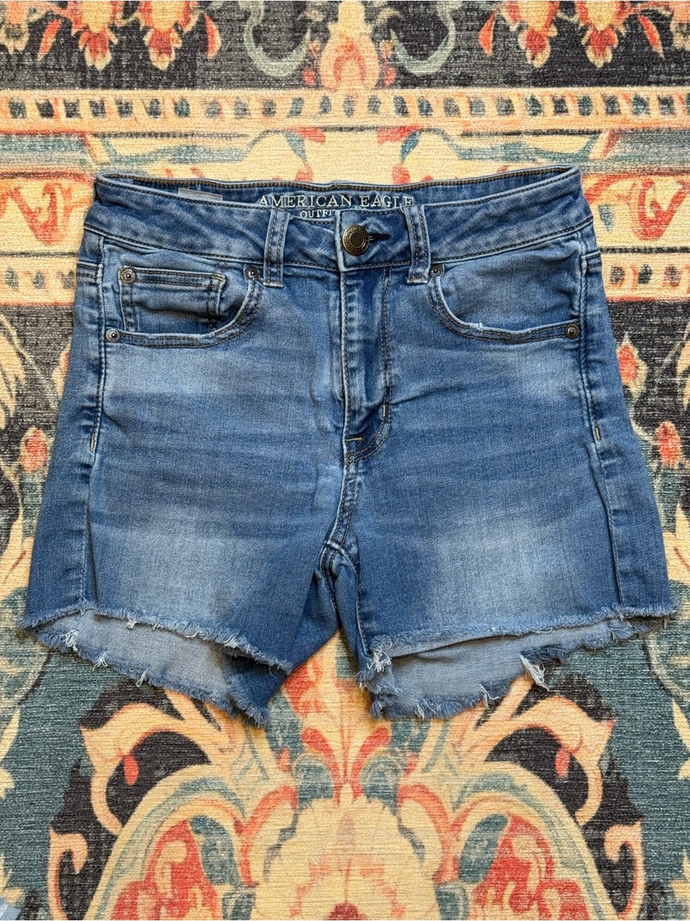 American Eagle Outfitters faded blue denim cutoff shorts